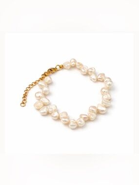 New with dust bag Oshena White Pearl Bracelet with Gold Toggle. Retail $160